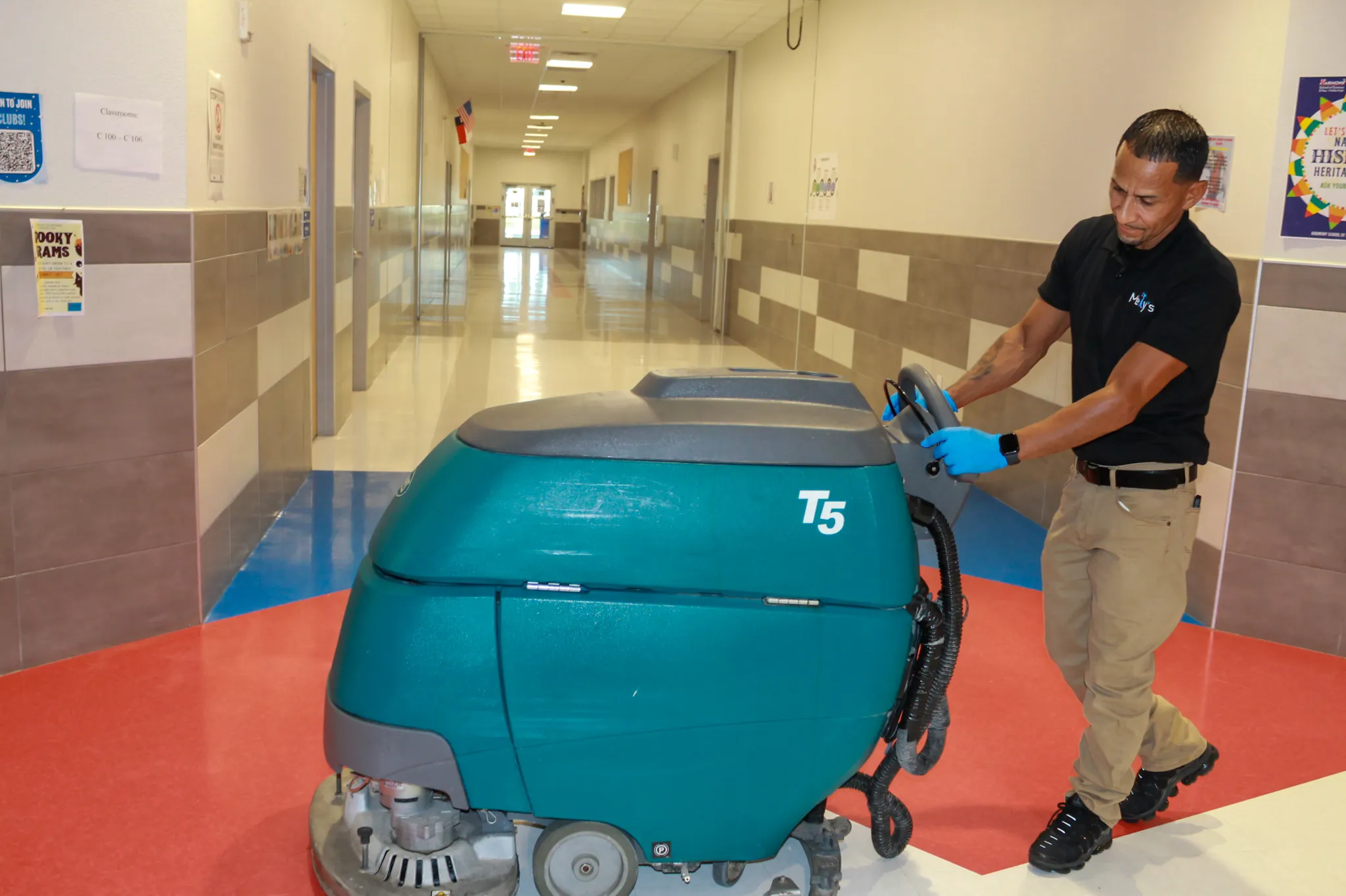Technician performing specialized cleaning on a floor